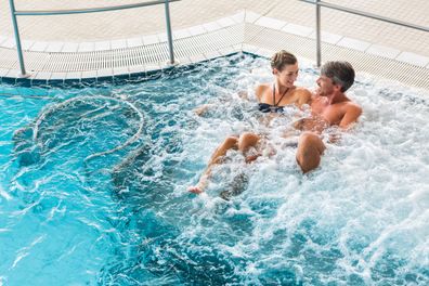 a happy couple bathing